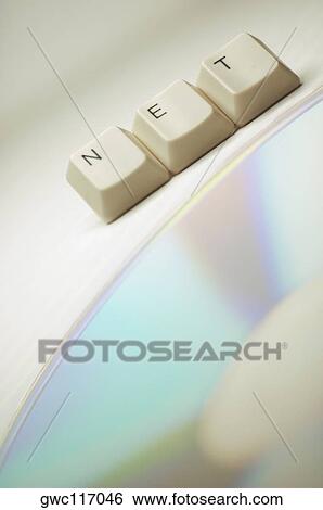 Close-up of computer keys near a CD spelling the word net View Large Photo Image Stock Photograph - Close-up of computer keys near a CD spelling the word net. Fotosearch