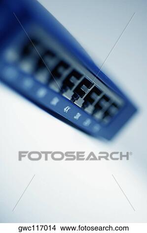 Picture - Close-up of network connection plug sockets on a network panel. Fotosearch