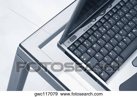 Stock Photo - High angle view of a laptop. Fotosearch