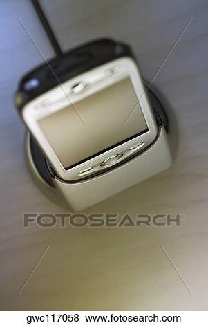 High angle view of a mobile phone View Large Photo Image Stock Photo - High angle view of a mobile phone. Fotosearch