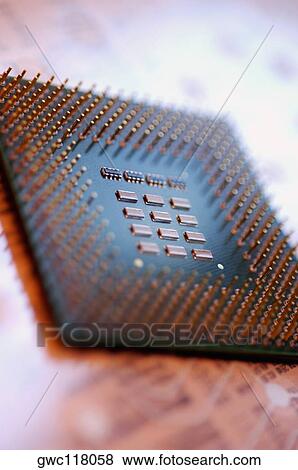 Close-up of a computer chip View Large Photo Image Stock Photo - Close-up of a computer chip. Fotosearch