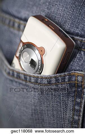 Stock Photo - Close-up of a mobile phone in a pocket. Fotosearch