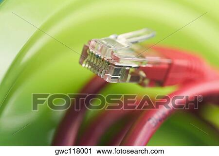 Stock Image - Close-up of a network connection plug. Fotosearch