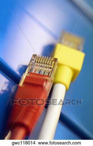 Picture - Close-up of two network connection plugs. Fotosearch
