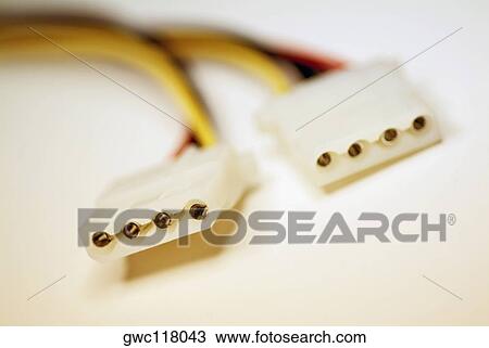 Stock Image - Close-up of two power cables. Fotosearch