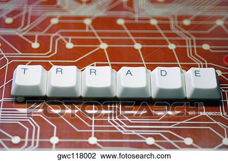 Stock Image - High angle view of computer keys on a circuit board. Fotosearch
