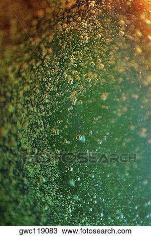 Close-up of bubbles in water View Large Photo Image Stock Image - Close-up of bubbles in water. Fotosearch