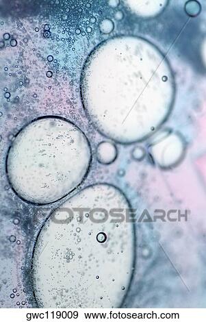 Close-up of bubbles in water View Large Photo Image Stock Photo - Close-up of bubbles in water. Fotosearch