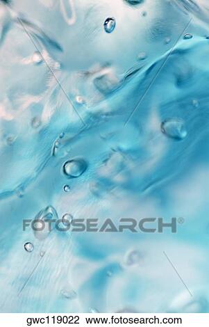 Stock Image - Close-up of liquid. Fotosearch