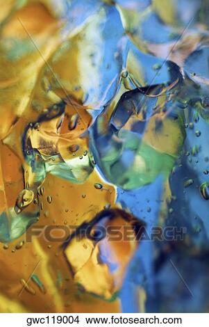 Close-up of water drops on ice cubes View Large Photo Image Picture - Close-up of water drops on ice cubes. Fotosearch