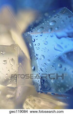 Close-up of water drops on ice cubes View Large Photo Image Picture - Close-up of water drops on ice cubes. Fotosearch
