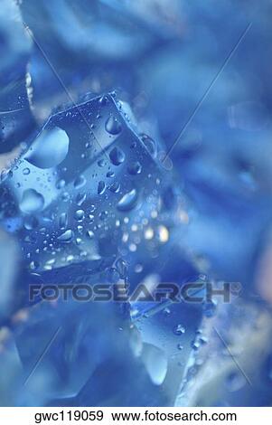 Close-up of water drops on ice cubes View Large Photo Image Stock Photo - Close-up of water drops on ice cubes. Fotosearch