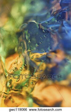 Close-up of water drops on ice cubes View Large Photo Image Stock Photograph - Close-up of water drops on ice cubes. Fotosearch