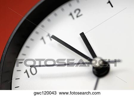 Close-up of a clock View Large Photo Image Stock Image - Close-up of a clock. Fotosearch