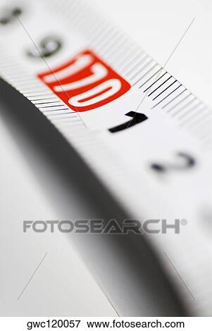 Close-up of a measuring tape View Large Photo Image Stock Photo - Close-up of a measuring tape. Fotosearch