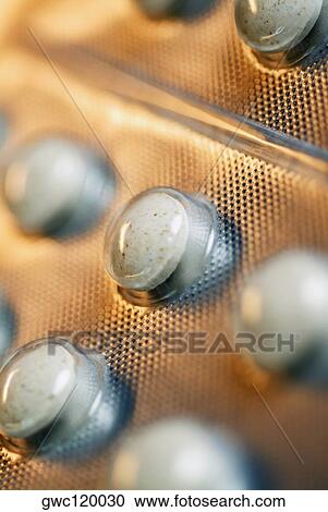 Close-up of pills in a blister pack View Large Photo Image Stock Image - Close-up of pills in a blister pack. Fotosearch