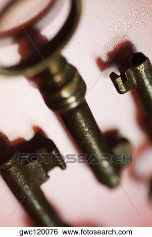 Close-up of three keys View Large Photo Image Stock Photograph - Close-up of three keys. Fotosearch