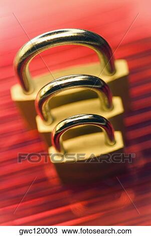 High angle view of three padlocks View Large Photo Image Stock Image - High angle view of three padlocks. Fotosearch