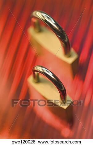 High angle view of two padlocks View Large Photo Image Stock Photograph - High angle view of two padlocks. Fotosearch