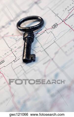 Close-up of a key on a map View Large Photo Image Stock Photograph - Close-up of a key on a map. Fotosearch