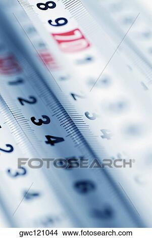 Close-up of a measuring tape View Large Photo Image Picture - Close-up of a measuring tape. Fotosearch