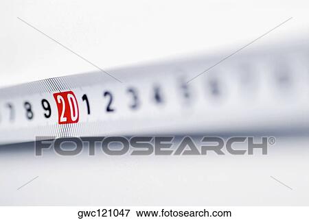 Close-up of a measuring tape View Large Photo Image Stock Photo - Close-up of a measuring tape. Fotosearch