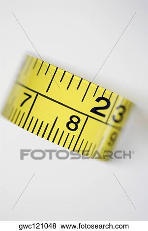 Close-up of a measuring tape View Large Photo Image Stock Photo - Close-up of a measuring tape. Fotosearch