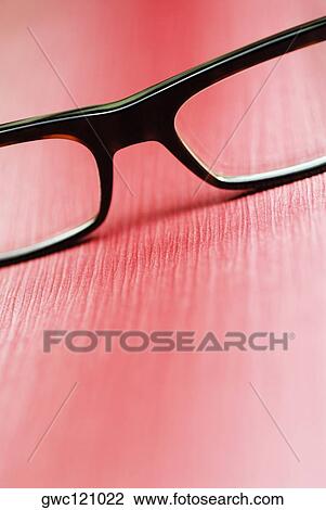 Close-up of a pair of eyeglasses View Large Photo Image Stock Image - Close-up of a pair of eyeglasses. Fotosearch