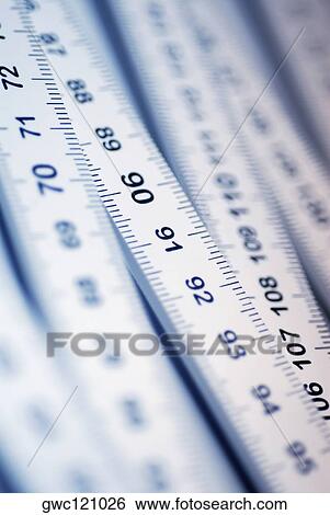 Close-up of a tape measure View Large Photo Image Stock Photograph - Close-up of a tape measure. Fotosearch