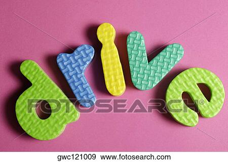 Close-up of alphabets spelling the word drive View Large Photo Image Stock Photo - Close-up of alphabets spelling the word drive. Fotosearch
