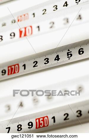 Close-up of measuring tapes View Large Photo Image Stock Image - Close-up of measuring tapes. Fotosearch