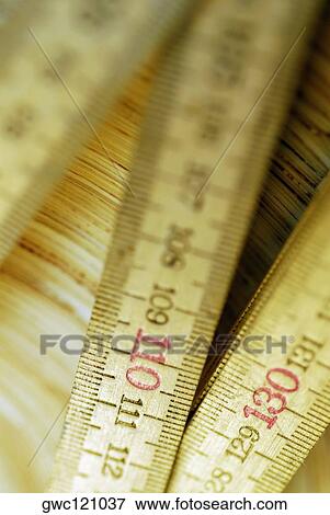 Close-up of three rulers View Large Photo Image Stock Photo - Close-up of three rulers. Fotosearch