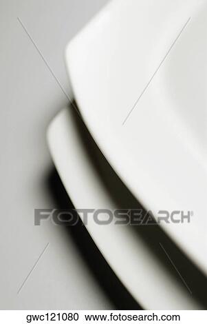 Close-up of two plates View Large Photo Image Stock Image - Close-up of two plates. Fotosearch