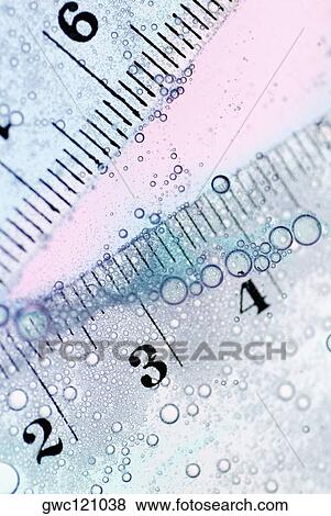 Close-up of two rulers View Large Photo Image Stock Photo - Close-up of two rulers. Fotosearch