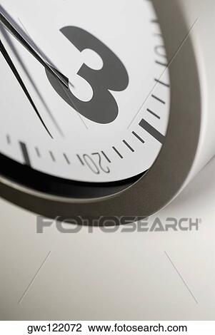 Stock Image - Close-up of a clock. Fotosearch