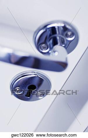 Close-up of a keyhole View Large Photo Image Stock Photograph - Close-up of a keyhole. Fotosearch