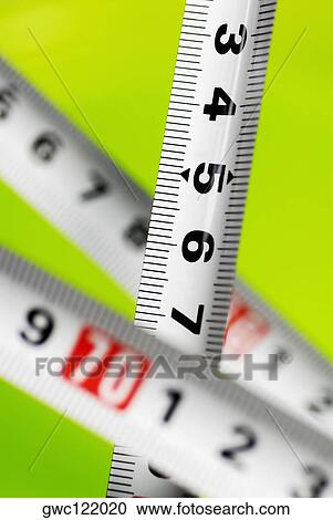 Close-up of a measuring tape View Large Photo Image Stock Image - Close-up of a measuring tape. Fotosearch