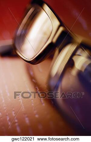 Stock Image - Close-up of a pair of eyeglasses. Fotosearch