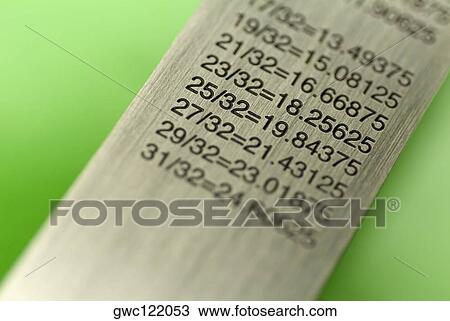 Close-up of a ruler with a conversion table View Large Photo Image Stock Image - Close-up of a ruler with a conversion table. Fotosearch