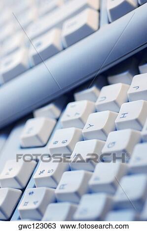Stock Image - Close-up of two computer keyboards. Fotosearch