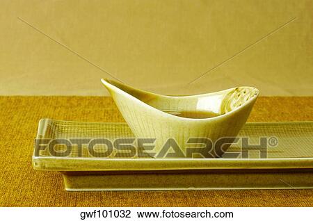 Close-up of a bowl of soy sauce on a serving tray View Large Photo Image Stock Image - Close-up of a bowl of soy sauce on a serving tray. Fotosearch