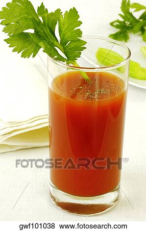 Close-up of a glass of juice View Large Photo Image Stock Photo - Close-up of a glass of juice. Fotosearch