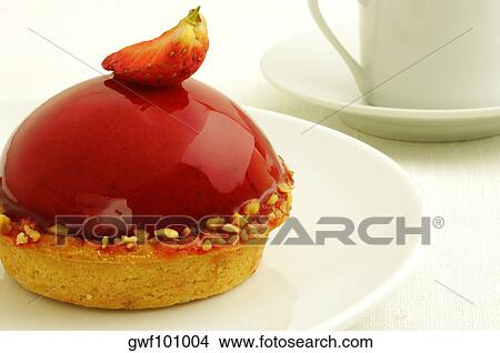 Picture - Close-up of a strawberry tart in a plate. Fotosearch