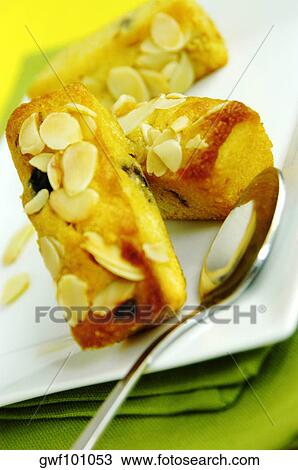 Stock Image - Close-up of cakes in a plate. Fotosearch