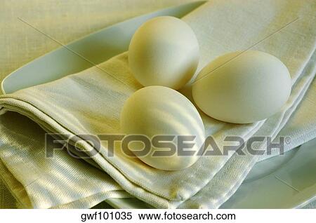 Close-up of eggs on a napkin in a plate View Large Photo Image Stock Photography - Close-up of eggs on a napkin in a plate. Fotosearch