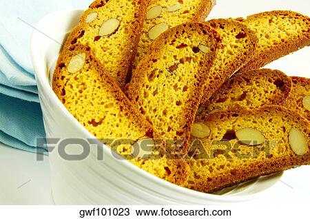 Close-up of slices of almond cake in a bowl View Large Photo Image Stock Image - Close-up of slices of almond cake in a bowl. Fotosearch