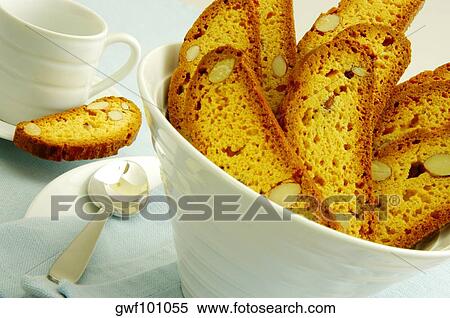 Close-up of slices of almond cake in a bowl View Large Photo Image Stock Photography - Close-up of slices of almond cake in a bowl. Fotosearch