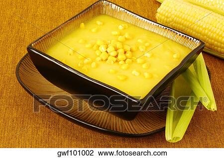 High angle view of a bowl of corn soup View Large Photo Image Stock Image - High angle view of a bowl of corn soup. Fotosearch