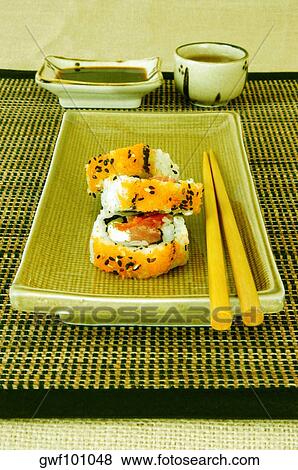 Stock Photo - High angle view of sushi on a serving tray. Fotosearch