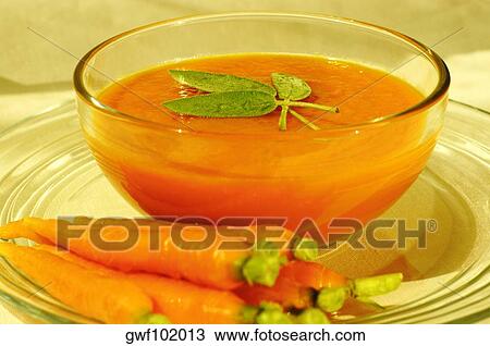 Close-up of a bowl of carrot soup View Large Photo Image Stock Image - Close-up of a bowl of carrot soup. Fotosearch